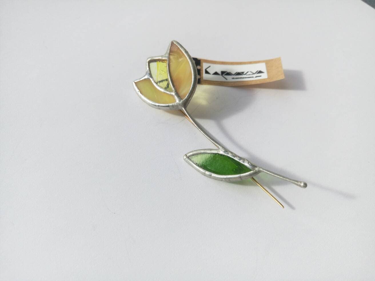 Yellow stained glass tulip brooch handmade floral pin with green leaf botanical jewelry closeup