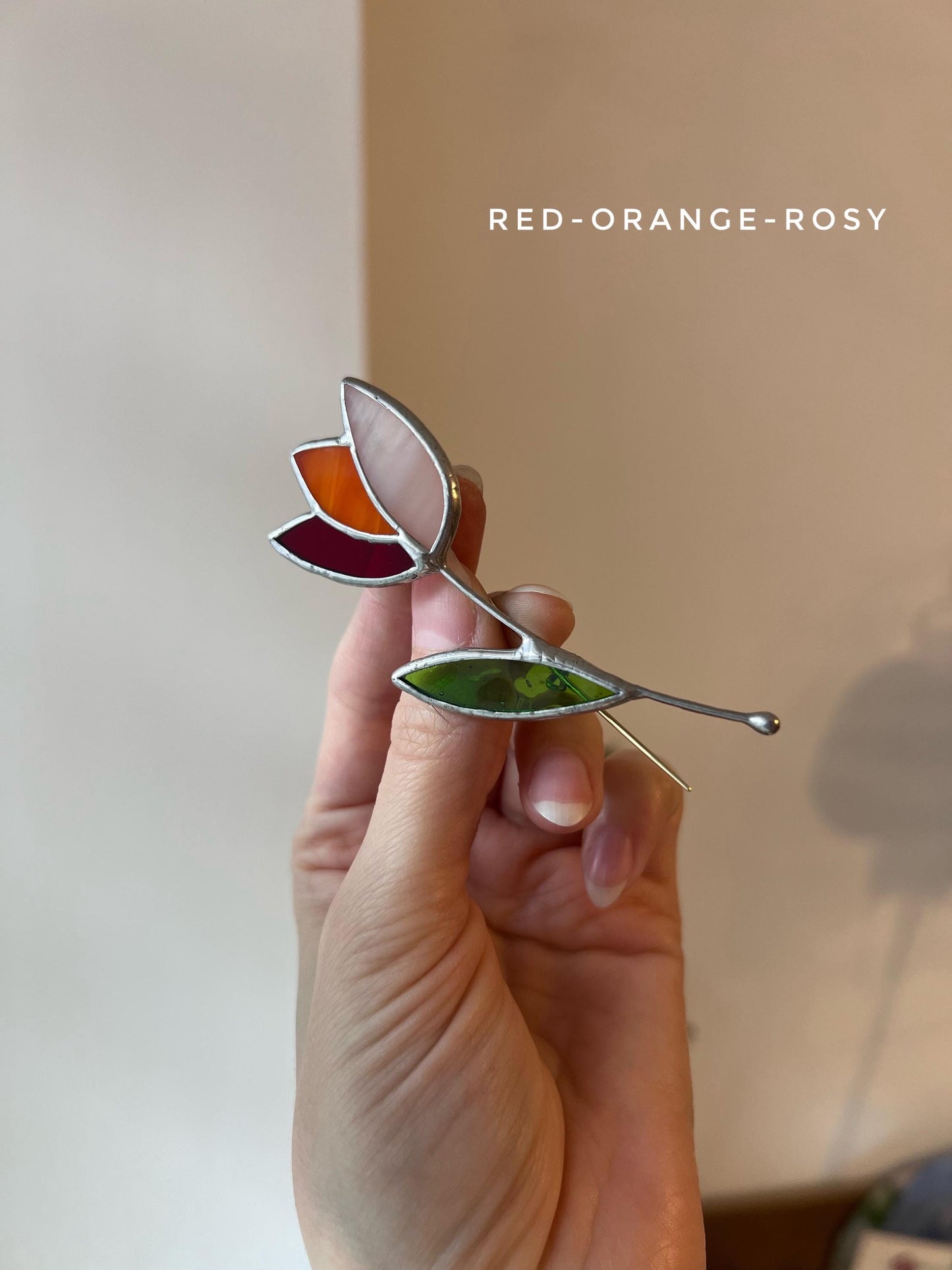 Red orange stained glass tulip brooch handmade summer flower pin closeup
